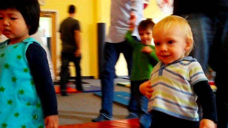 child at play in gym