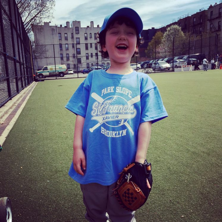 tee-ball player laughs