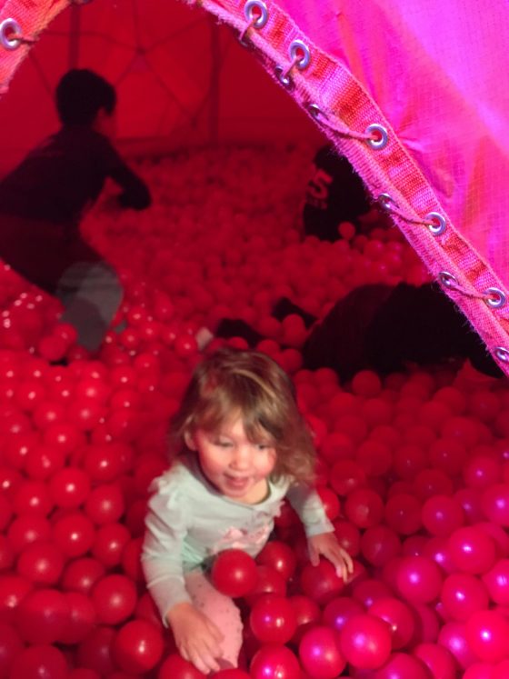 A ball pit blood drop, with the balls representing blood cells.